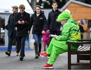 26 December 2023; Paul Hughes dressed as the Grinch studies the form prior to racing on day one of the Leopardstown Christmas Festival at Leopardstown Racecourse in Dublin. Photo by David Fitzgerald/Sportsfile