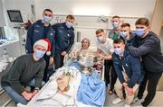 25 December 2023; Patrick Corcoran, from Moate, Westmeath, with Dublin footballers during the All-Ireland Senior Football Championship winners visit to the Mater Misericordiae University Hospital on Eccles Street in Dublin. Photo by Ray McManus/Sportsfile