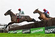 26 December 2023; Found A Fifty, with Jack Kennedy up, left, jump the last ahead of Facile Vega, with Patrick Mullins up, on their way to winning the Racing Post Novice Steeplechase on day one of the Leopardstown Christmas Festival at Leopardstown Racecourse in Dublin. Photo by David Fitzgerald/Sportsfile