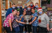 25 December 2023; Staff with Dublin footballers during the All-Ireland Senior Football Championship winners visit to Children's Health Ireland at Temple Street in Dublin. Photo by Ray McManus/Sportsfile
