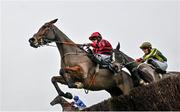 26 December 2023; Path D'oroux, with Keith Donoghue up, falls as The Folkes Tiara, with Rachael Blackmore up, left, make their way to winning the New Smart View By Racing Post Handicap Steeplechase on day one of the Leopardstown Christmas Festival at Leopardstown Racecourse in Dublin. Photo by David Fitzgerald/Sportsfile
