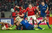 26 December 2023; Gavin Coombes of Munster is tackled by Max Deegan of Leinster during the United Rugby Championship match between Munster and Leinster at Thomond Park in Limerick. Photo by Brendan Moran/Sportsfile
