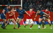 26 December 2023; Brian Gleeson and Tom Ahern of Munster contest possession with Jack Conan and Andrew Porter of Leinster during the United Rugby Championship match between Munster and Leinster at Thomond Park in Limerick. Photo by Brendan Moran/Sportsfile