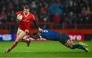 26 December 2023; Jack Crowley of Munster is tackled by Max Deegan of Leinster during the United Rugby Championship match between Munster and Leinster at Thomond Park in Limerick. Photo by Brendan Moran/Sportsfile