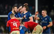 26 December 2023; Joe McCarthy of Leinster, centre, is congratulated by teammates Jason Jenkins, left, and Dan Sheehan after winning his side a penalty during the United Rugby Championship match between Munster and Leinster at Thomond Park in Limerick. Photo by Seb Daly/Sportsfile