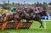 27 December 2023; Intellotto, with Daryl Jacob up, left, jumps the last on their way to winning the Paddy Power I Have No Idea It Is Maiden Hurdle ahead of Mordor, with Danny Gilligan up, centre, and Lucy Wang, with Mike O'Connor up on day two of the Leopardstown Christmas Festival at Leopardstown Racecourse in Dublin. Photo by David Fitzgerald/Sportsfile