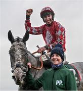 27 December 2023; Jack Kennedy celebrates on Caldwell Potter with groom Kerry Martin after winning the Paddy Power Future Champions Novice Hurdle on day two of the Leopardstown Christmas Festival at Leopardstown Racecourse in Dublin. Photo by David Fitzgerald/Sportsfile