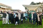 27 December 2023; Jockey Danny Mullins with Meetingofthewaters and winning connections after the Paddy Power Steeplechase on day two of the Leopardstown Christmas Festival at Leopardstown Racecourse in Dublin. Photo by David Fitzgerald/Sportsfile