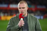 9 December 2023; Recently retired Munster player Keith Earls is interviewed at half-time during the Investec Champions Cup Pool 3 Round 1 match between Munster and Aviron Bayonnais at Thomond Park in Limerick. Photo by Brendan Moran/Sportsfile