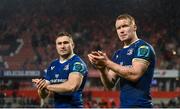 26 December 2023; Leinster players Ciarán Frawley, right, and Jordan Larmour after the United Rugby Championship match between Munster and Leinster at Thomond Park in Limerick. Photo by Seb Daly/Sportsfile