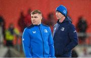 26 December 2023; Leinster head coach Leo Cullen, right, and Garry Ringrose before the United Rugby Championship match between Munster and Leinster at Thomond Park in Limerick. Photo by Seb Daly/Sportsfile