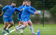 28 December 2023; Tadhg Furlong, right, and Michael Milne, left, during a Leinster rugby squad training session at UCD in Dublin. Photo by Eóin Noonan/Sportsfile