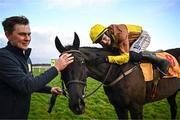 28 December 2023; Jockey Paul Townend celebrates with groom Adam Connolly after riding Galopin Des Champs to win the Savills Steeplechase on day three of the Leopardstown Christmas Festival at Leopardstown Racecourse in Dublin. Photo by Harry Murphy/Sportsfile