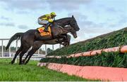 28 December 2023; Galopin Des Champs, with Paul Townend up, jumps the last, first time round, on their way to winning the Savills Steeplechase on day three of the Leopardstown Christmas Festival at Leopardstown Racecourse in Dublin. Photo by Harry Murphy/Sportsfile