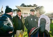 28 December 2023; Trainer Gordon Elliott and winning connection Rob Acheson speak to jockey Jack Kennedy after sending out Irish Point to win the Jack de Bromhead Christmas Hurdle on day three of the Leopardstown Christmas Festival at Leopardstown Racecourse in Dublin. Photo by Harry Murphy/Sportsfile