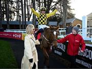 29 December 2023; Jockey Paul Townend celebrates on State Man alongside owner Marie Donnelly and groom Rachel Robin after winning the Matheson Hurdle on day four of the Leopardstown Christmas Festival at Leopardstown Racecourse in Dublin. Photo by Harry Murphy/Sportsfile