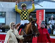29 December 2023; Jockey Paul Townend celebrates on State Man alongside owner Marie Donnelly and groom Rachel Robin after winning the Matheson Hurdle on day four of the Leopardstown Christmas Festival at Leopardstown Racecourse in Dublin. Photo by Harry Murphy/Sportsfile