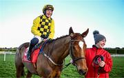 29 December 2023; Jockey Paul Townend celebrates on State Man alongside groom Rachel Robin after winning the Matheson Hurdle on day four of the Leopardstown Christmas Festival at Leopardstown Racecourse in Dublin. Photo by Harry Murphy/Sportsfile