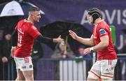 1 January 2024; Fineen Wycherley of Munster, right, celebrates his side's first try with team-mate Shane Daly that was later ruled out during the United Rugby Championship match between Connacht and Munster at The Sportsground in Galway. Photo by Piaras Ó Mídheach/Sportsfile