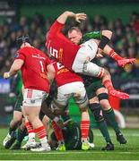 1 January 2024; Tadhg Beirne of Munster is lifted by Joe Joyce of Connacht during the United Rugby Championship match between Connacht and Munster at The Sportsground in Galway. Photo by Seb Daly/Sportsfile