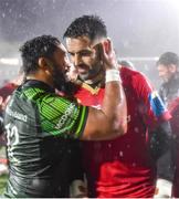 1 January 2024; Conor Murray of Munster is consoled by Bundee Aki of Connacht after the United Rugby Championship match between Connacht and Munster at The Sportsground in Galway. Photo by Piaras Ó Mídheach/Sportsfile