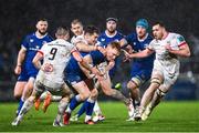 1 January 2024; Ciarán Frawley of Leinster is tackled by Jacob Stockdale of Ulster during the United Rugby Championship match between Leinster and Ulster at RDS Arena in Dublin. Photo by Ramsey Cardy/Sportsfile