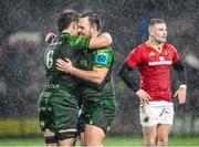 1 January 2024; Connacht players Cian Prendergast, left, and Jack Aungier celebrate after their side's victory in the United Rugby Championship match between Connacht and Munster at The Sportsground in Galway. Photo by Piaras Ó Mídheach/Sportsfile