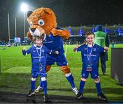 1 January 2024; Leinster match day mascots Liam Dowling, aged nine, left, and James McHugh, aged six, with Leo the Lion before the United Rugby Championship match between Leinster and Ulster at the RDS Arena in Dublin. Photo by Harry Murphy/Sportsfile