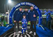 1 January 2024; Leinster match day mascots Liam Dowling, aged nine, with Leinster players, from left, Ross Byrne, Michael Milne and Max Deegan before the United Rugby Championship match between Leinster and Ulster at the RDS Arena in Dublin. Photo by Harry Murphy/Sportsfile