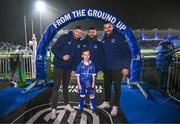 1 January 2024; Leinster match day mascots James McHugh, aged six, with Leinster players, from left, Ross Byrne, Michael Milne and Max Deegan before the United Rugby Championship match between Leinster and Ulster at the RDS Arena in Dublin. Photo by Harry Murphy/Sportsfile
