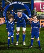 1 January 2024; Leinster captain Caelan Doris with match day mascots Liam Dowling, aged nine, and James McHugh, aged six, before the United Rugby Championship match between Leinster and Ulster at the RDS Arena in Dublin. Photo by Harry Murphy/Sportsfile