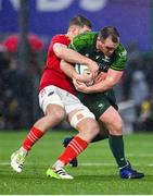 1 January 2024; Peter Dooley of Connacht is tackled by Jack O'Donoghue of Munster during the United Rugby Championship match between Connacht and Munster at The Sportsground in Galway. Photo by Seb Daly/Sportsfile