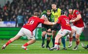 1 January 2024; Shamus Hurley-Langton of Connacht in action against Munster players John Ryan, left, and Rory Scannell, 12, during the United Rugby Championship match between Connacht and Munster at The Sportsground in Galway. Photo by Seb Daly/Sportsfile