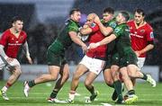 1 January 2024; Simon Zebo of Munster is tackled by Connacht players, from left, Shayne Bolton, Dave Heffernan and Caolin Blade during the United Rugby Championship match between Connacht and Munster at The Sportsground in Galway. Photo by Piaras Ó Mídheach/Sportsfile
