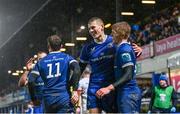 1 January 2024; Sam Prendergast, left, and Tommy O'Brien of Leinster celebrate a try by Rob Russell during the United Rugby Championship match between Leinster and Ulster at RDS Arena in Dublin. Photo by Ramsey Cardy/Sportsfile