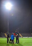 2 January 2024; Kerry coach Shane Briggs sets out the warm up drills with the help of Jack, left, and Fionn Molumphy, sons of Kerry manager Stephen Molumphy, before the Co-Op Superstores Munster Hurling League Group B match between Kerry and Waterford at Austin Stack Park in Tralee, Kerry. Photo by Brendan Moran/Sportsfile