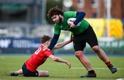 3 January 2024; Joshua Clarke of South East Area evades the tackle of Lorcan Craik of North East during the BearingPoint Shane Horgan Cup Round 3 match between South East and North East at Energia Park in Dublin. Photo by Ben McShane/Sportsfile