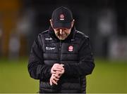 3 January 2024; Derry manager Mickey Harte checks his watch before the Bank of Ireland Dr McKenna Cup Group B match between Cavan and Derry at Kingspan Breffni in Cavan. Photo by Piaras Ó Mídheach/Sportsfile