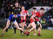 3 January 2024; Conor McGrogan of Derry in action against Oisín Kiernan of Cavan during the Bank of Ireland Dr McKenna Cup Group B match between Cavan and Derry at Kingspan Breffni in Cavan. Photo by Piaras Ó Mídheach/Sportsfile