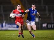 3 January 2024; Diarmuid Baker of Derry in action against Niall Carolan of Cavan during the Bank of Ireland Dr McKenna Cup Group B match between Cavan and Derry at Kingspan Breffni in Cavan. Photo by Piaras Ó Mídheach/Sportsfile