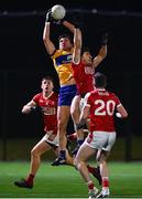 3 January 2024; Brian McNamara of Clare in action against Paul Walsh of Cork during the McGrath Cup Group B match between between Clare and Cork at Clarecastle GAA Astro Pitch in Clarecastle, Clare. Photo by Eóin Noonan/Sportsfile
