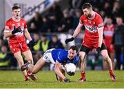 3 January 2024; Brian O'Connell of Cavan in action against Mark Doherty and Niall Loughlin, right, of Derry during the Bank of Ireland Dr McKenna Cup Group B match between Cavan and Derry at Kingspan Breffni in Cavan. Photo by Piaras Ó Mídheach/Sportsfile