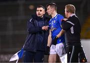 3 January 2024; Cavan manager Raymond Galligan speaking with Peter Smith on the sideline during the Bank of Ireland Dr McKenna Cup Group B match between Cavan and Derry at Kingspan Breffni in Cavan. Photo by Piaras Ó Mídheach/Sportsfile