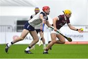 4 January 2024; Micheál Lyons of Galway in action against AJ Willis of New York during the Connacht Hurling League semi-final match between Galway and New York at University of Galway Connacht GAA AirDome in Bekan, Mayo. Photo by Tyler Miller/Sportsfile