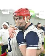 4 January 2024; Darragh Moran of New York, right, embraces team-mate Ruadhan Mulrooney after their side's victory in the Connacht Hurling League semi-final match between Galway and New York at University of Galway Connacht GAA AirDome in Bekan, Mayo. Photo by Tyler Miller/Sportsfile