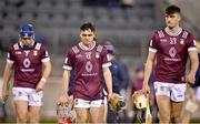 4 January 2024; Westmeath players, from left,  Kevin Regan, Peter Clarke and Rian Holding leave the field dejected after their side's defeat in the Dioralyte Walsh Cup Round 1 match between Dublin and Westmeath at Parnell Park in Dublin. Photo by Sam Barnes/Sportsfile