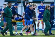 5 January 2024; Chris Cosgrave of Leinster is stretchered off with an injury during the Challenge Match between Ireland U20s and Leinster Development at Energia Park in Dublin. Photo by Harry Murphy/Sportsfile