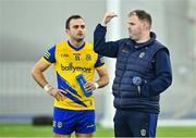 5 January 2024; Roscommon manager Davy Burke in conversation with Donie Smith before the Connacht FBD League quarter-final match between Sligo and Roscommon at University of Galway Connacht GAA AirDome in Bekan, Mayo. Photo by Piaras Ó Mídheach/Sportsfile