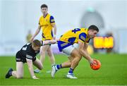 5 January 2024; Ronan Daly of Roscommon in action against Peter Laffey of Sligo during the Connacht FBD League quarter-final match between Sligo and Roscommon at University of Galway Connacht GAA AirDome in Bekan, Mayo. Photo by Piaras Ó Mídheach/Sportsfile