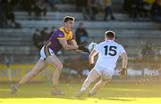 6 January 2024; John Roche of Wexford in action against Jimmy Hyland of Kildare during the Dioralyte O'Byrne Cup quarter-final match between Wexford and Kildare at Chadwicks Wexford Park in Wexford. Photo by Sam Barnes/Sportsfile